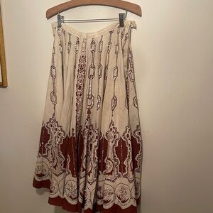 Casting skirt with sequins has spots